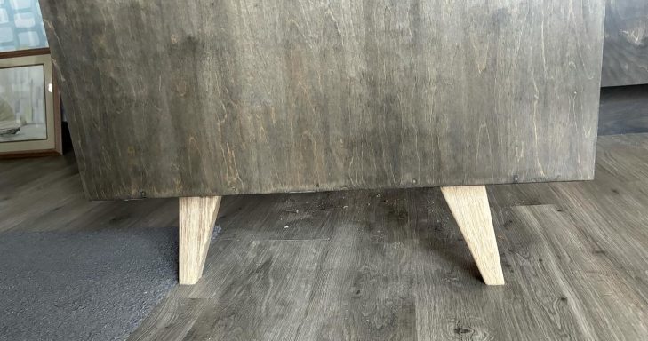 oak legs give this unit a mid century feel